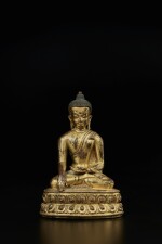 A gilt-bronze figure of Shakyamuni Buddha, Tibet, 15th century