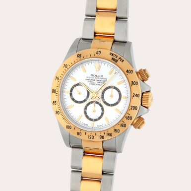 View full screen - View 1 of Lot 262. Daytona, Reference 16523 | A stainless steel and yellow gold chronograph wristwatch | Circa 1998.