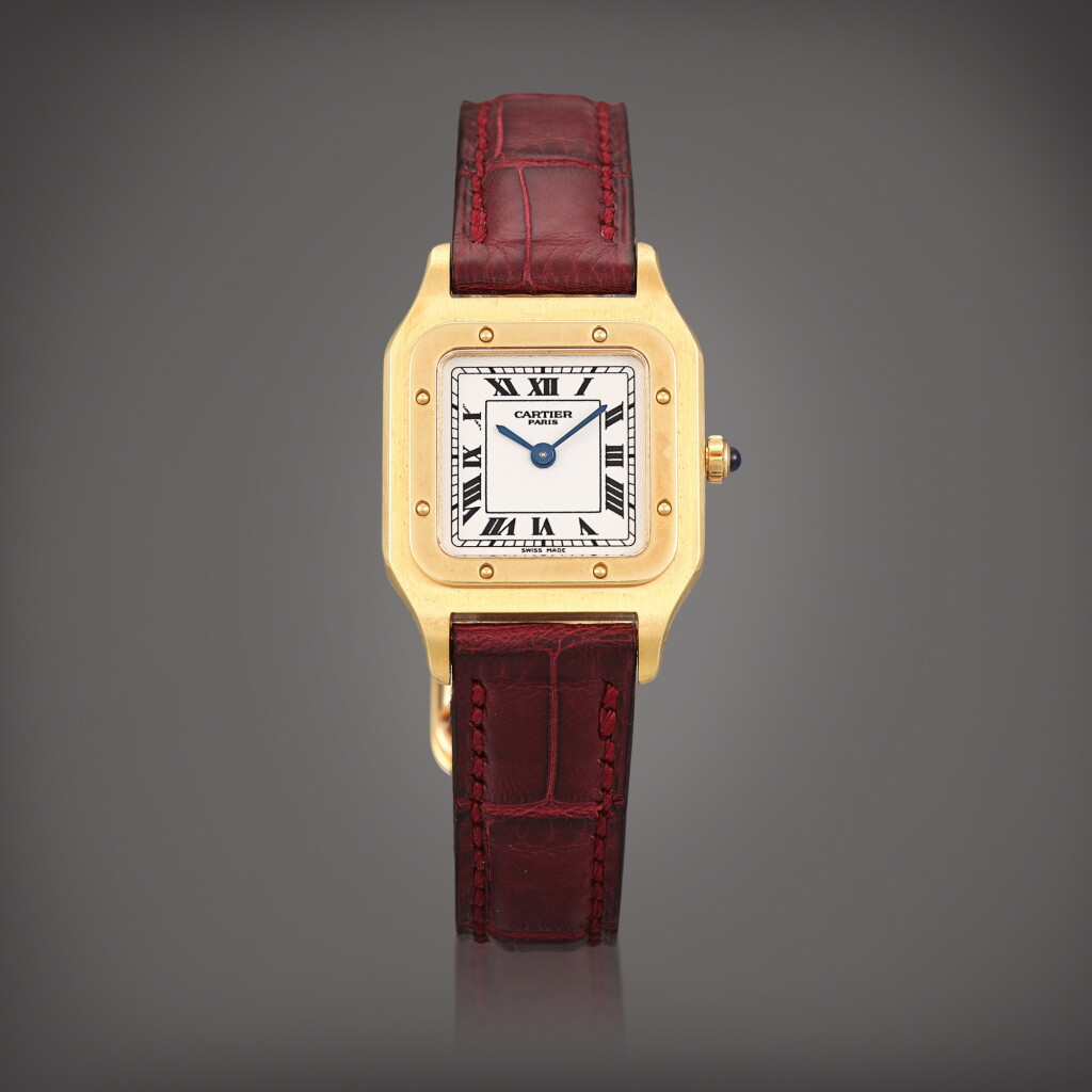 View full screen - View 1 of Lot 754. Santos, Reference 1577B | A yellow gold wristwatch, Circa 1995 | 卡地亞 | Santos 型號1577B | 黃金腕錶,約1995年製.