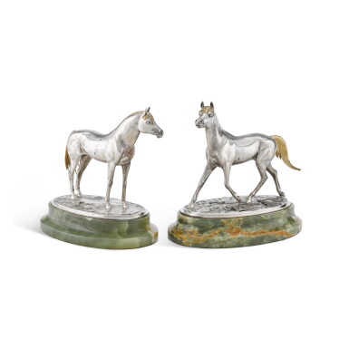 View full screen - View 1 of Lot 256. A pair of parcel-gilt silver horse models, Garrard Ltd, London, 1975.