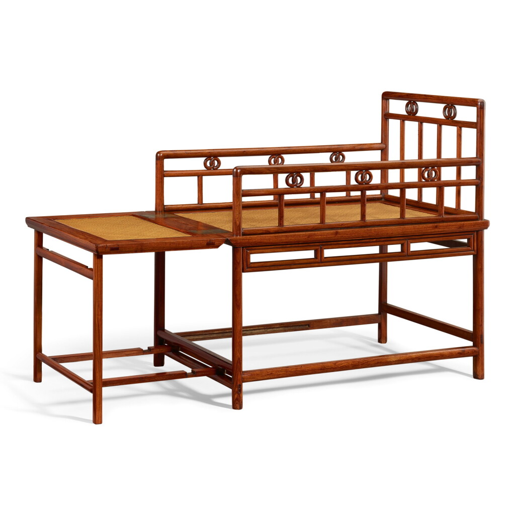 View full screen - View 1 of Lot 33. A HUANGHUALI RECLINING CHAIR QING DYNASTY, 18TH CENTURY | 清十八世紀 黃花梨雙環卡子花拉開式躺椅.