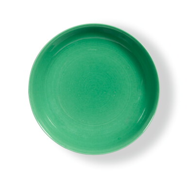 View full screen - View 1 of Lot 19. A RARE GREEN-GLAZED SAUCER DISH, QIANLONG INCISED MARK AND PERIOD | 清乾隆 蘋果綠釉盤 《大清乾隆年製》款.