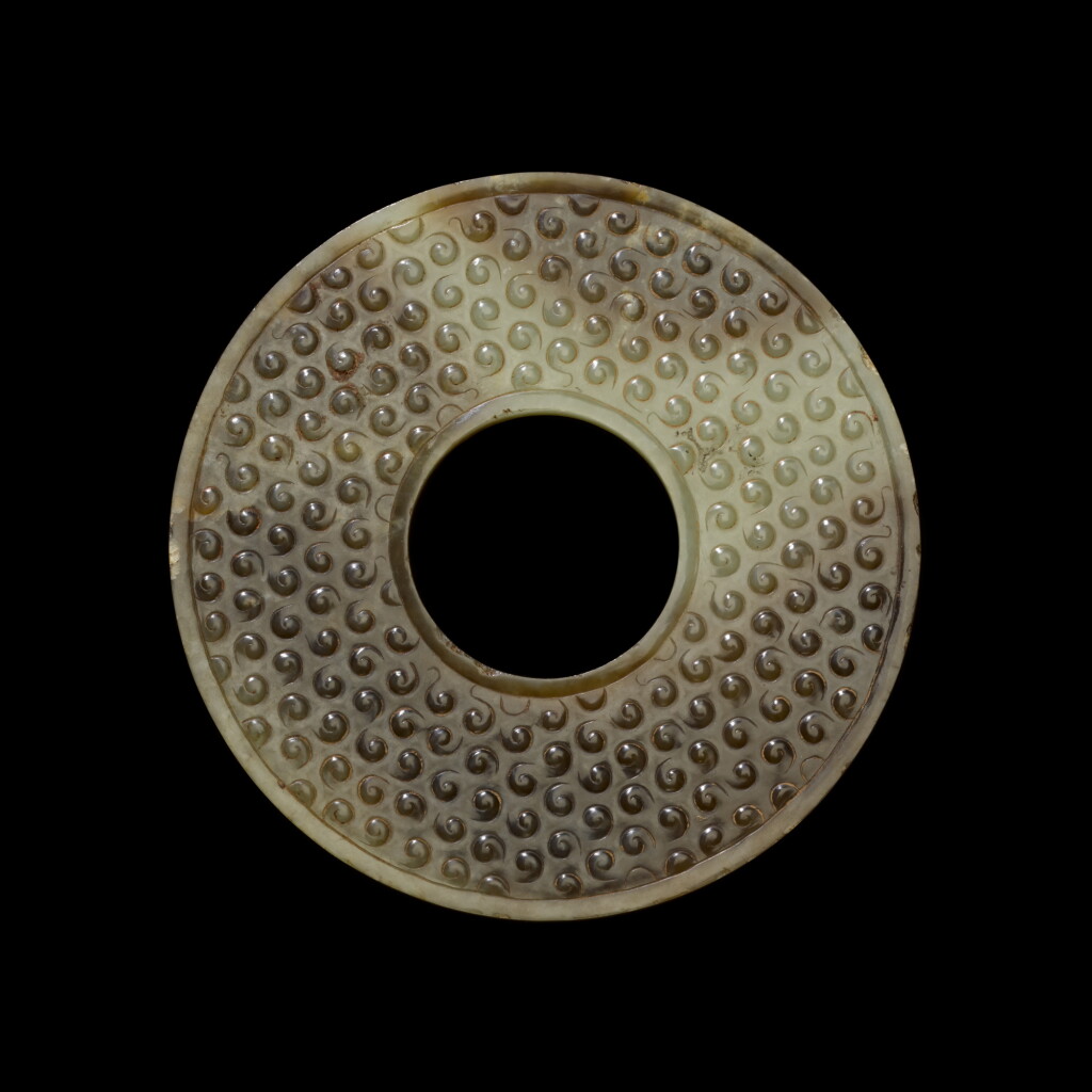 View full screen - View 1 of Lot 163. A green jade disc, bi, Eastern Zhou dynasty | 東周 玉璧.
