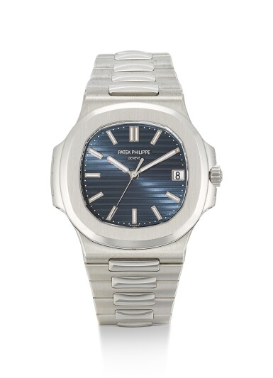 View full screen - View 1 of Lot 24. PATEK PHILIPPE | NAUTILUS, REFERENCE 5711, A BRAND NEW PLATINUM WRISTWATCH WITH DATE, BLUE JEANS DIAL AND BRACELET, CIRCA 2014 .