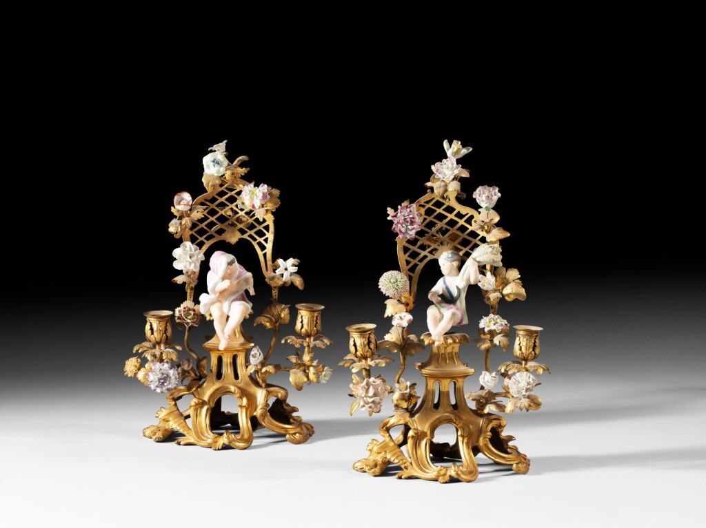View full screen - View 1 of Lot 57. A pair of Louis XV gilt-bronze and Meissen porcelain candelabra | Paire de candélabres en porcelaine de Meissen et bronze doré d'époque Louis XV.