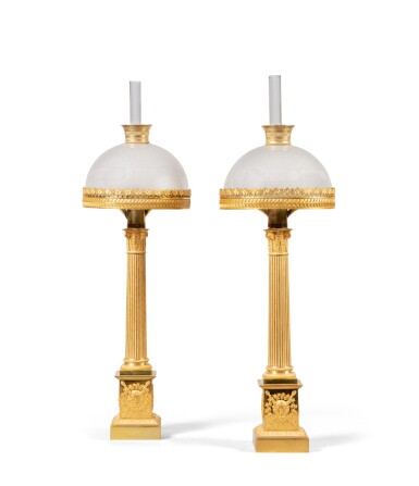 View full screen - View 1 of Lot 20. A pair of Restauration gilt-bronze carcel lamps, circa 1820 | Paire de lampes Carcel en bronze doré d'époque Restauration, vers 1820.