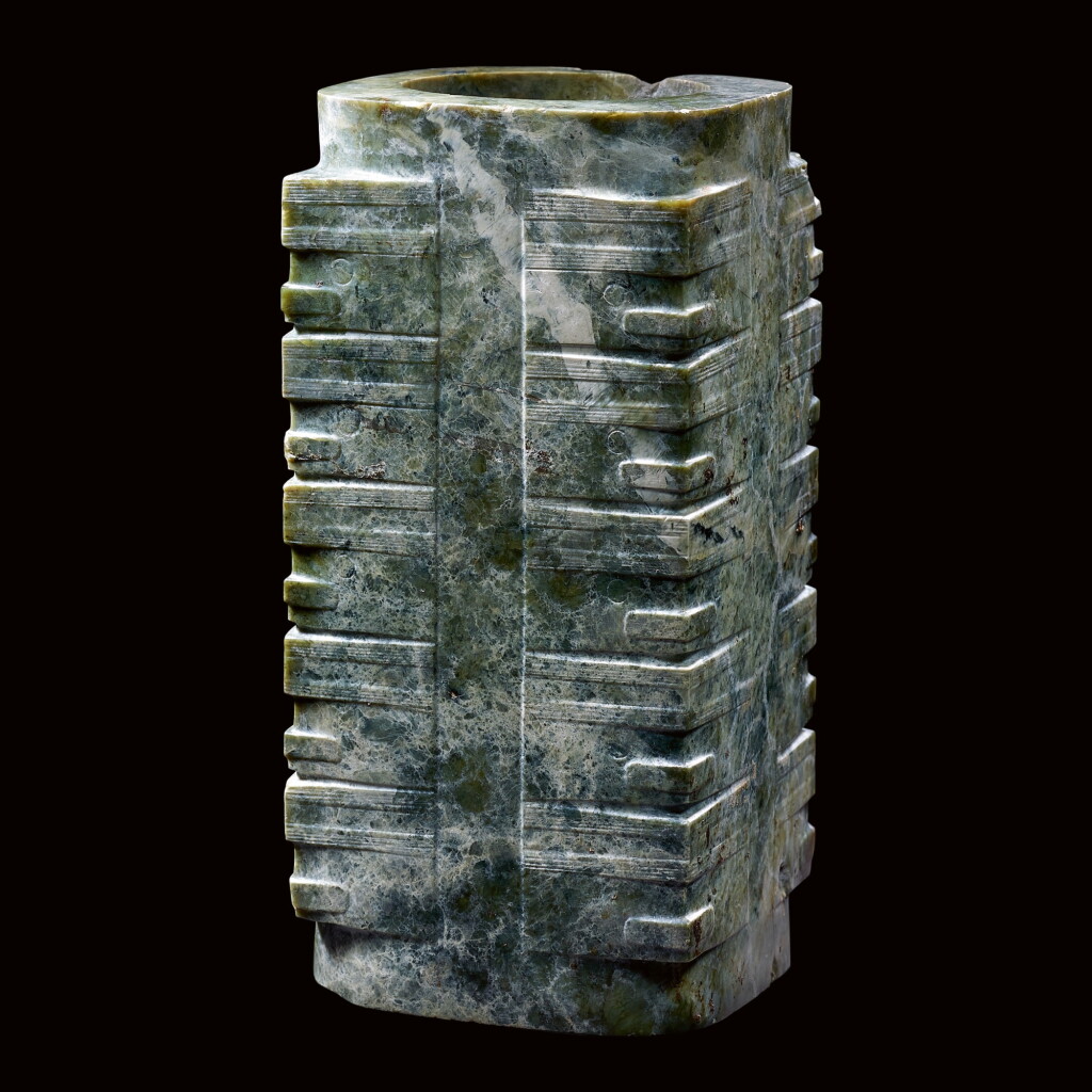 View full screen - View 1 of Lot 52. A MOTTLED GREEN JADE CONG NEOLITHIC PERIOD, LIANGZHU CULTURE | 新石器時代良渚文化 玉琮.