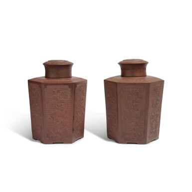 View full screen - View 1 of Lot 85. Two Yixing ‘peony’ hexagonal tea canisters and covers, Qing dynasty, 18th century .