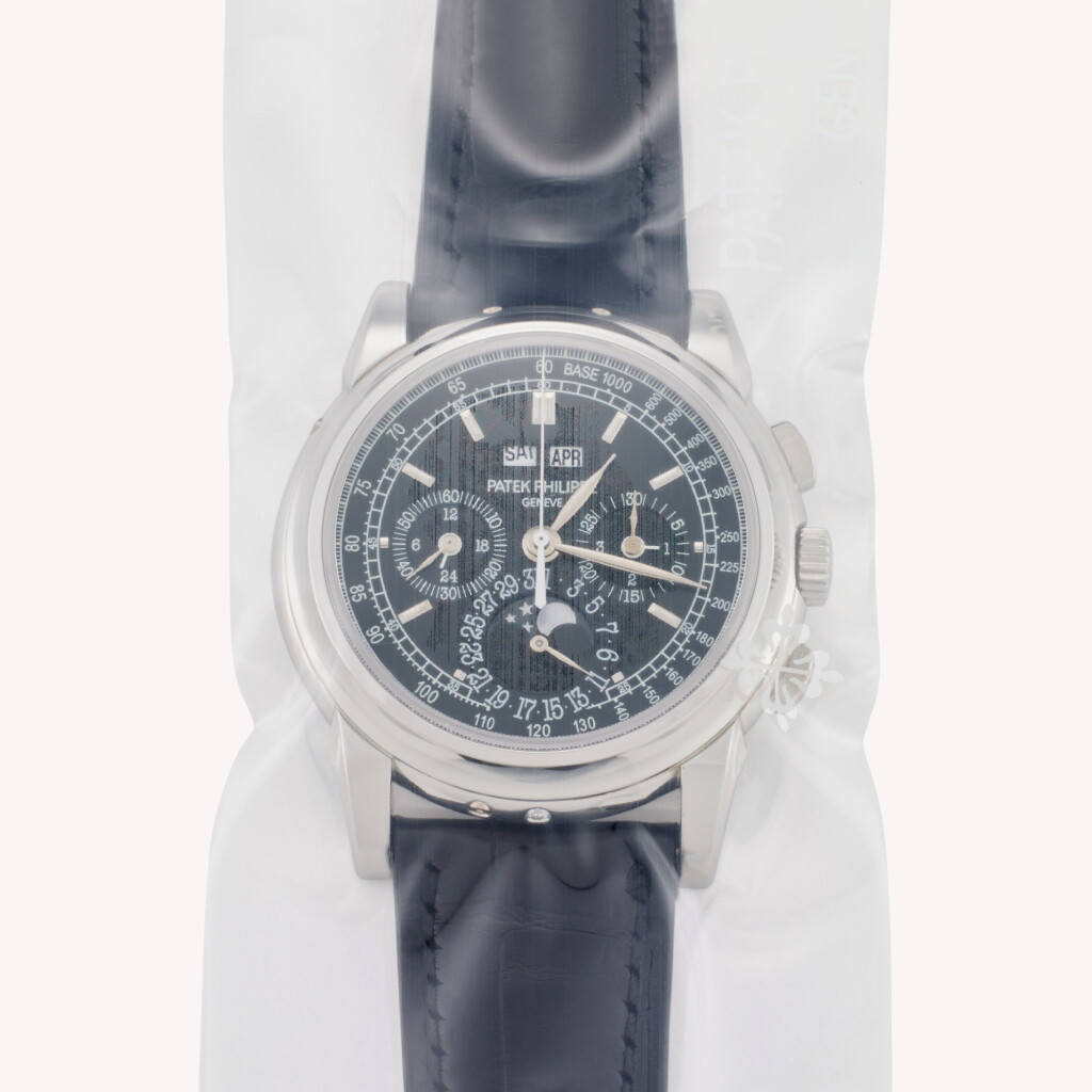 View full screen - View 1 of Lot 102. Reference 5970P-001 | A platinum perpetual calendar chronograph wristwatch, Single Sealed, Circa 2009.