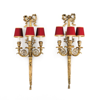 View full screen - View 1 of Lot 308. A pair of Louis XVI style gilt metal three branch wall lights, late 19th/early 20th century.