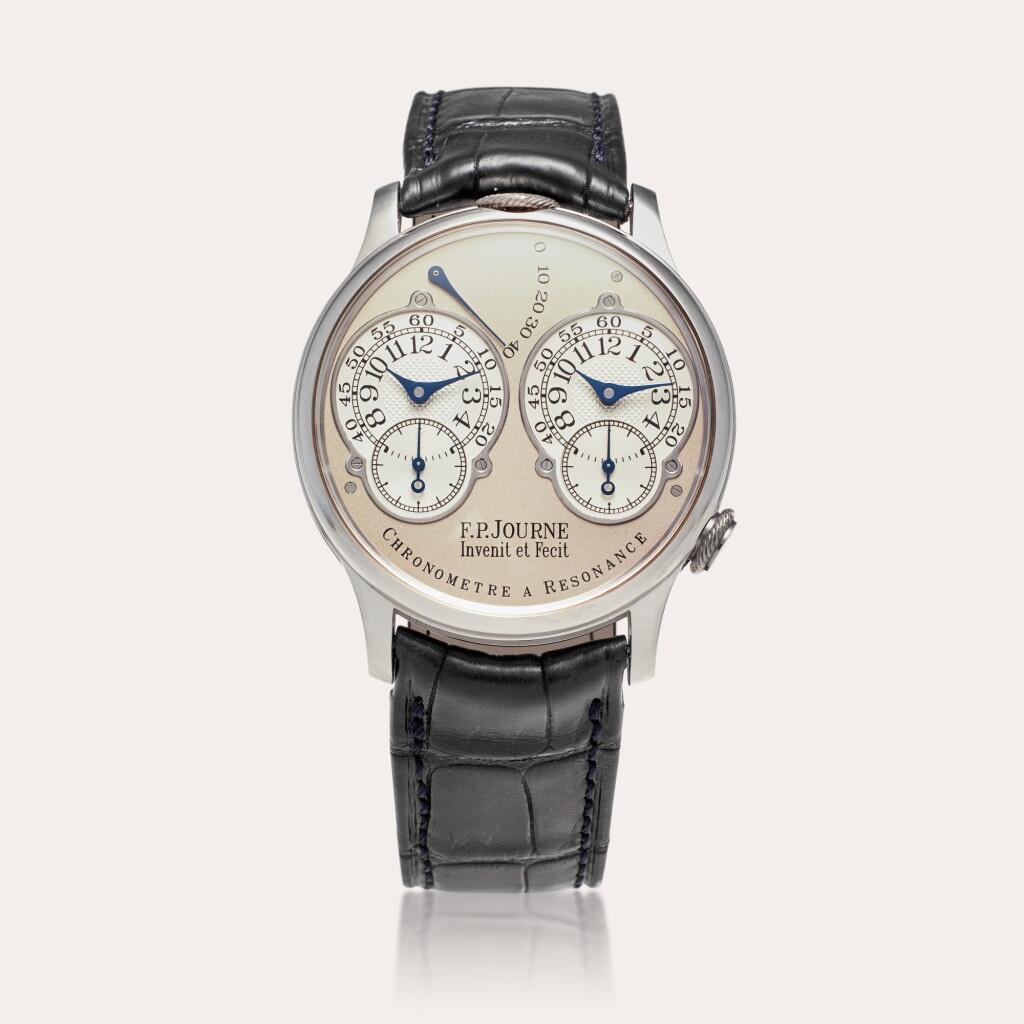 View full screen - View 1 of Lot 124. Chronomètre à Résonance | A platinum dual time zone wristwatch with power reserve indication and brass movement, Circa 2001.