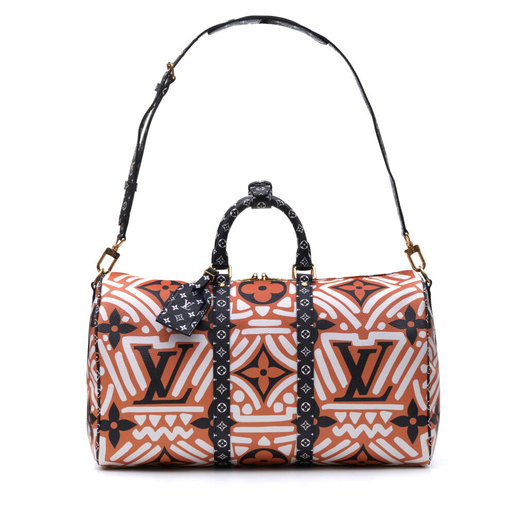 View full screen - View 1 of Lot 318. Caramel and Cream Crafty Keepall Bandouliere 45cm in Monogram Giant Coated Canvas with Gold Tone Hardware, 2020.