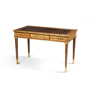View full screen - View 1 of Lot 181. A neoclassical gilt-bronze mounted mahogany, ebony, tinted horn and ivory veneered games table from the Château de Saint-Cloud, late 18th/early 19th century, after a model by Jean-Henri Riesener | Table à jeux en placage d'acajou, ébène, ivoire, corne teintée et bronze doré d'époque néoclassique, fin XVIIIe/début XIXe siècle, provenant du château de Saint-Cloud, d'après un modèle de Jean-Henri Riesener.
