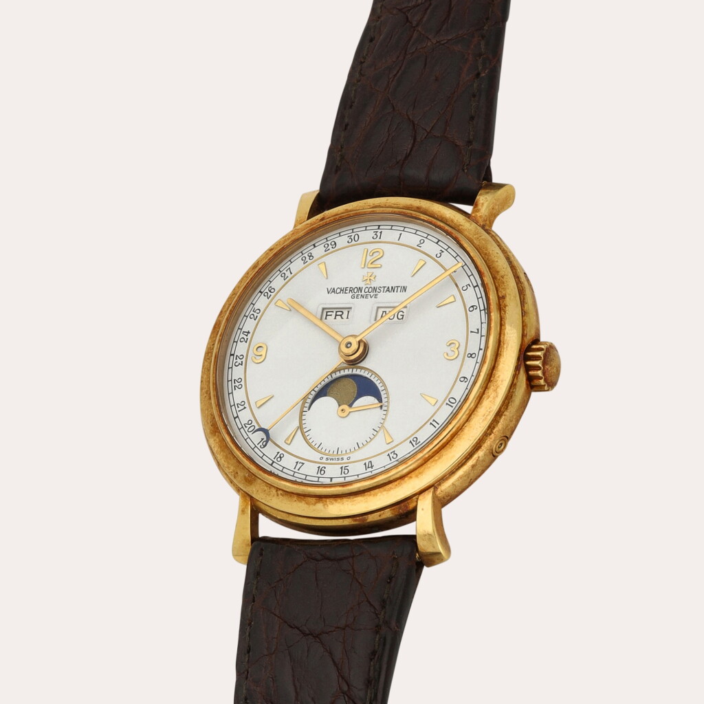 View full screen - View 1 of Lot 267. Reference 37150 | A yellow gold triple calendar wristwatch with moon phases | Circa 1995.