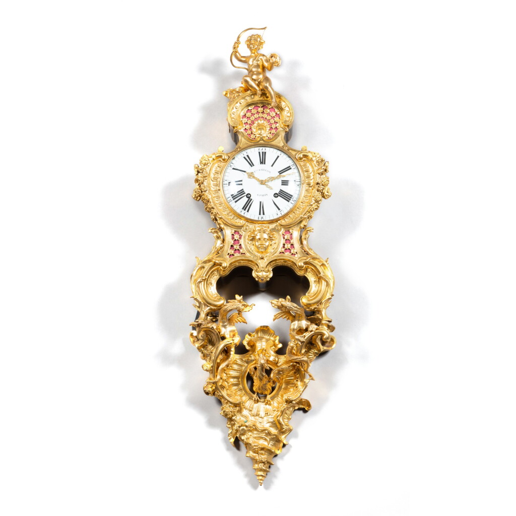 View full screen - View 1 of Lot 497. A Louis XV gilt-bronze cartel clock in the manner of Charles Cressent, Paris circa 1745, the enamel dial signed Et.Ne Baillon A Paris, the clock and bracket with Couronne-C poinçon, the lion and shell side mounts 19th century.
