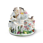A MEISSEN GROUP OF A FREEMASON COUPLE TAKING CHOCOLATE CIRCA 1745