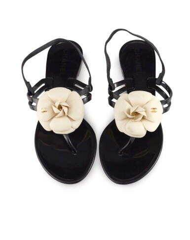 View full screen - View 1 of Lot 76. CHANEL | PAIR OF BLACK PVC AND LEATHER CAMELLIA SANDALS .