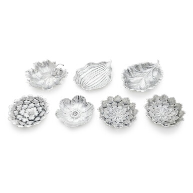 View full screen - View 1 of Lot 86. A group of seven Italian silver flower and leaf-form dishes, Buccellati, Milan and Bologna, modern.