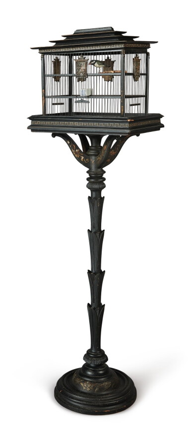 View full screen - View 1 of Lot 61. A CARVED AND EBONIZED WOOD BIRD CAGE ON STAND IN THE CHINESE TASTE.