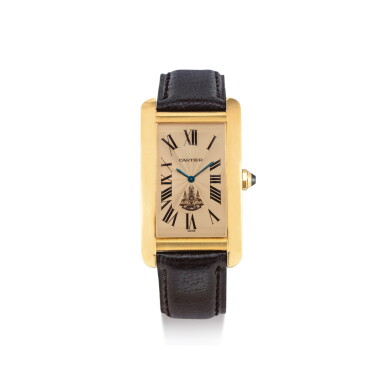 View full screen - View 1 of Lot 360. CARTIER | TANK AMERICAINE, REFERENCE 1735 1, A YELLOW GOLD WRISTWATCH WITH SALMON DIAL, MADE TO COMMEMORATE KING RAMA IX AND HIS ROYAL 50TH ANNIVERSARY, CIRCA 1990.