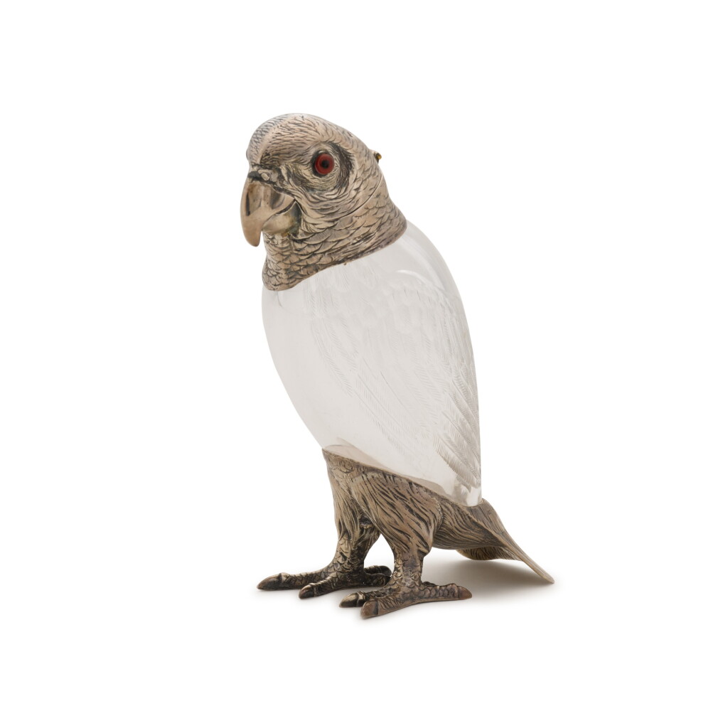 View full screen - View 1 of Lot 51. A Victorian silver-mounted glass liqueur decanter in the form of a parrot, Henry William Curry, London, 1883.