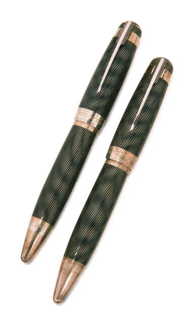 View full screen - View 1 of Lot 1036. MONTBLANC | A LIMITED EDITION SET OF STERLING SILVER AND BLACK LACQUER WRITING INSTRUMENTS, CONSISTING OF ONE FOUNTAIN PEN AND ONE BALLPOINT PEN, MADE TO COMMEMORATE ALFRED HITCHCOCK, CIRCA 2012.