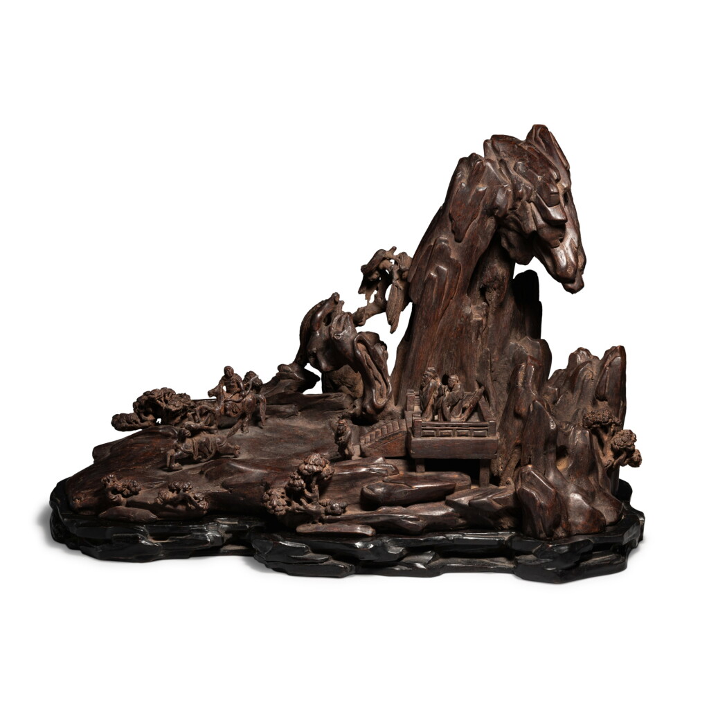 Voir en plein écran - Voir 1 du lot 681. A large 'chenxiangmu' 'literati' mountain, Qing dynasty, 18th / 19th century | 清十八 / 十九世紀 沉香木雕人物故事圖山子.