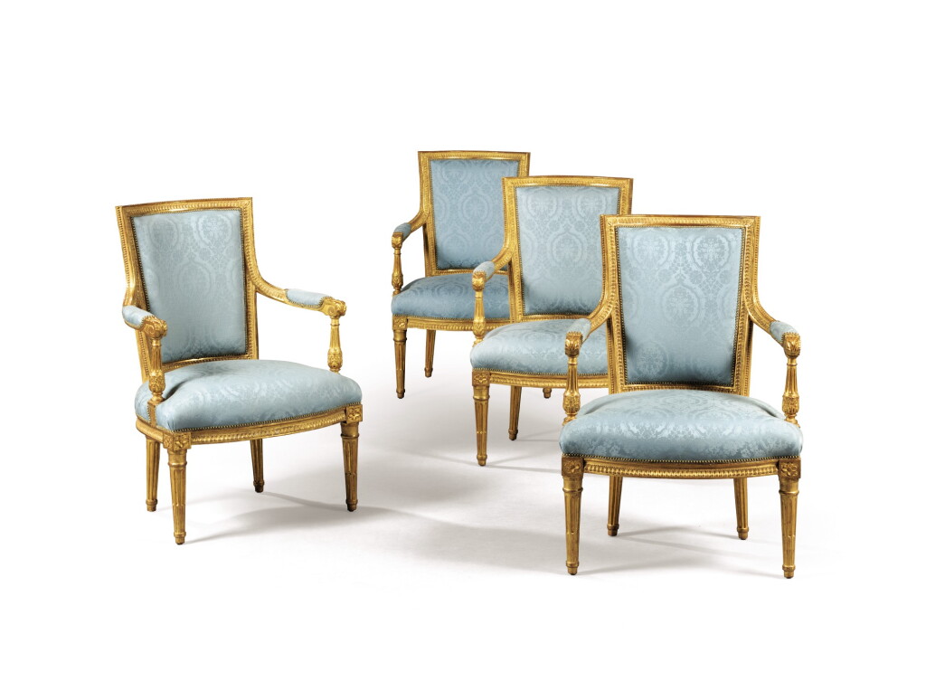 View full screen - View 1 of Lot 121. A Louis XVI style set of four giltwood armchairs, late 19th/20th century (regilt).