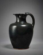 An Attic Black-Glazed Trefoil Oinochoe, circa mid-5th Century B.C.
