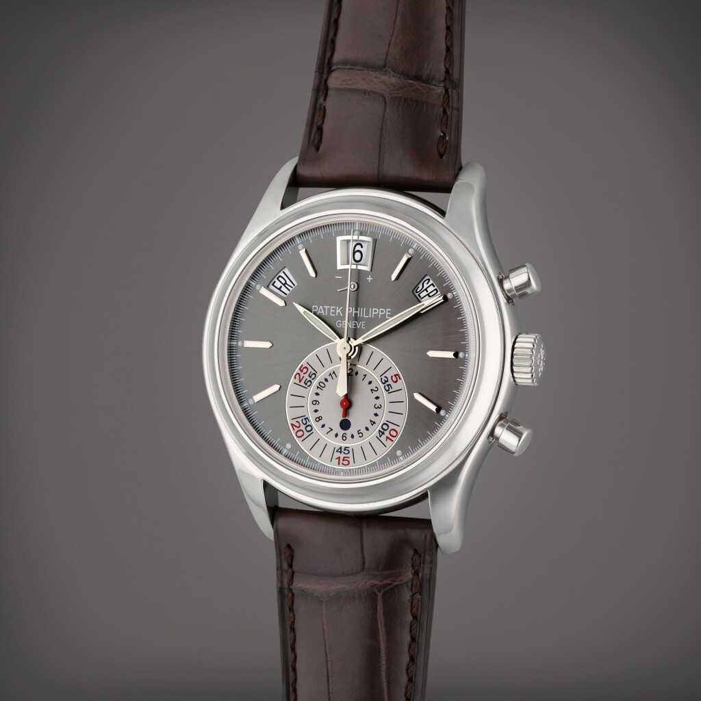 View full screen - View 1 of Lot 22. Reference 5960P | A platinum automatic annual calendar flyback chronograph wristwatch with power reserve and day/night indication, Made in 2011.