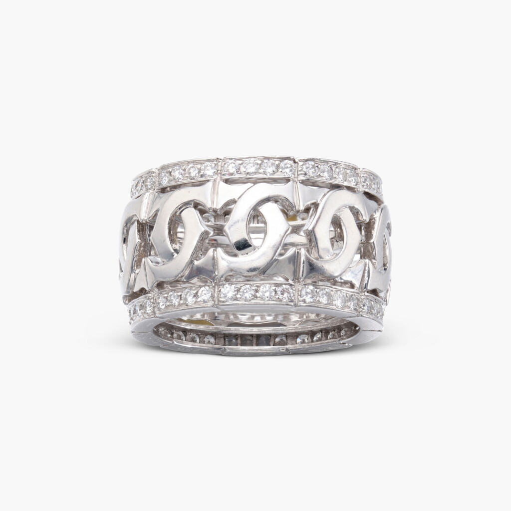 View full screen - View 1 of Lot 708. Diamond 'C de Cartier' Ring.