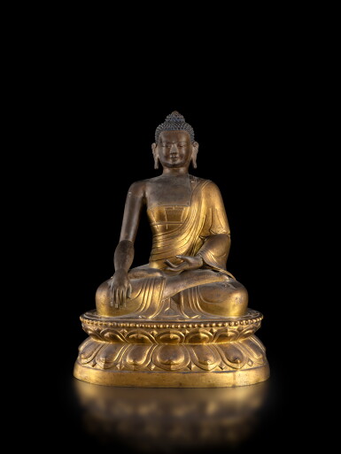 View full screen - View 1 of Lot 61. A large gilt-copper alloy repoussé seated figure of Buddha, circa 1800.