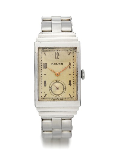 View full screen - View 1 of Lot 74. ROLEX | REF 3565, A STAINLESS STEEL RECTANGULAR WRISTWATCH WITH BRACELET CIRCA 1940.