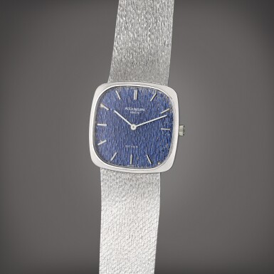 View full screen - View 1 of Lot 284. Reference 3566 1 Golden Ellipse | Retailed by Beyer: A white gold cushion shaped bracelet watch, Circa 1970.