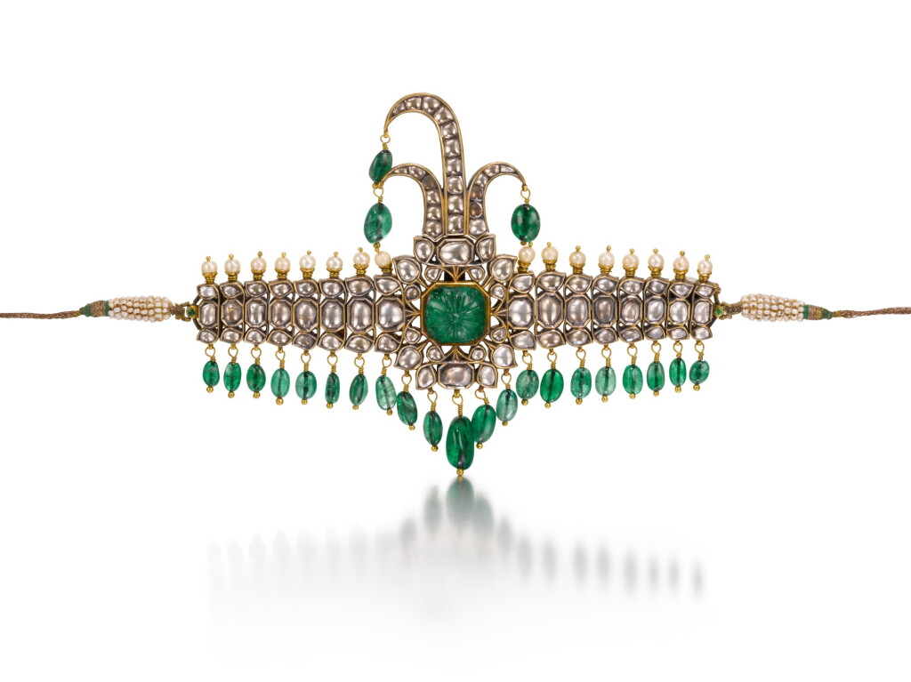 View full screen - View 1 of Lot 131. A gem-set and enamelled turban ornament (sarpech), India, late 19th/early 20th century.