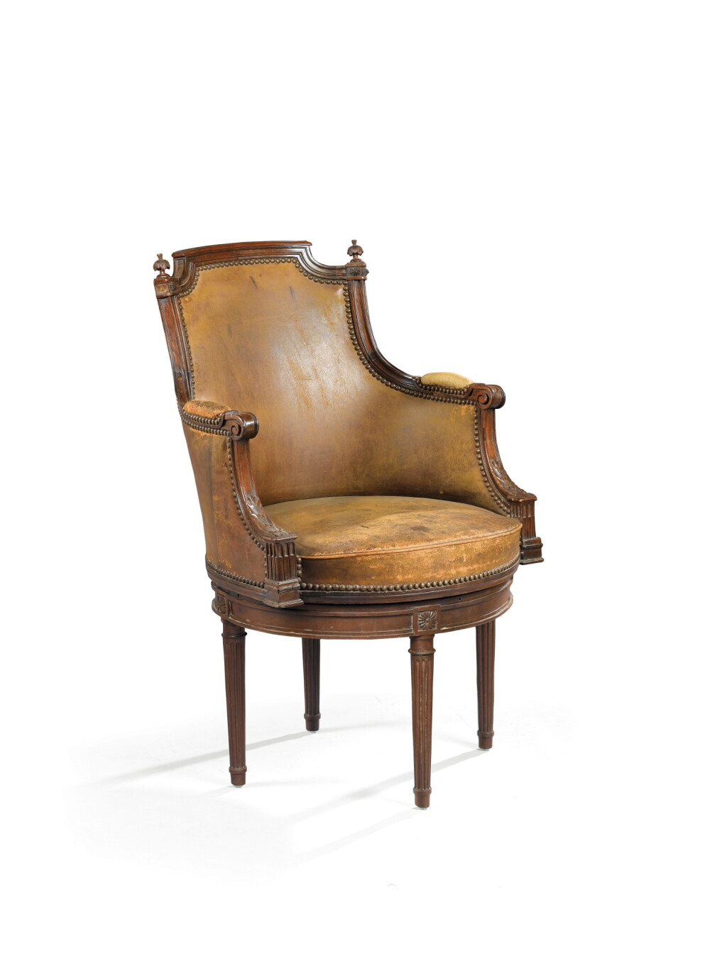 View full screen - View 1 of Lot 6. A LOUIS XVI MAHOGANY SWIVEL ARMCHAIR ATTIBUTED TO GEORGES JACOB.