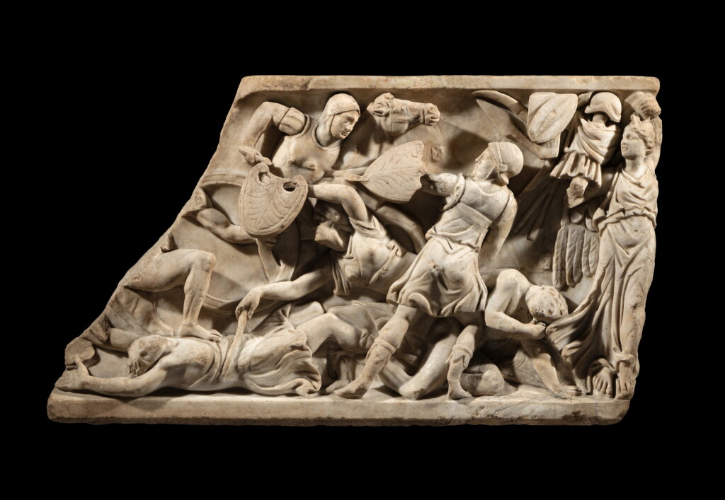 View full screen - View 1 of Lot 65. A Roman Marble Amazonomachy Sarcophagus Relief Fragment, Antonine Period, circa 150-170 A.D..