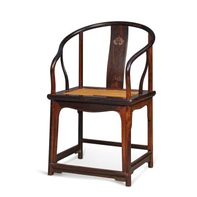 View full screen - View 1 of Lot 306. A 'zitan' horseshoe-back armchair (Quanyi), Qing dynasty, 18th / 19th century | 清十八 / 十九世紀 紫檀雕如意紋圈椅.