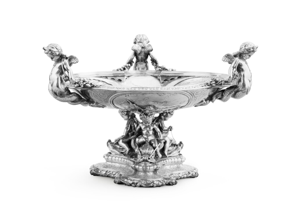 View full screen - View 1 of Lot 64. A French silver centretable, Emile Froment-Meurice, Paris, circa 1860 | Surtout de table en argent à décor de 3 putti et 3 tritons par Emile Froment-Meurice, Paris, vers 1860.