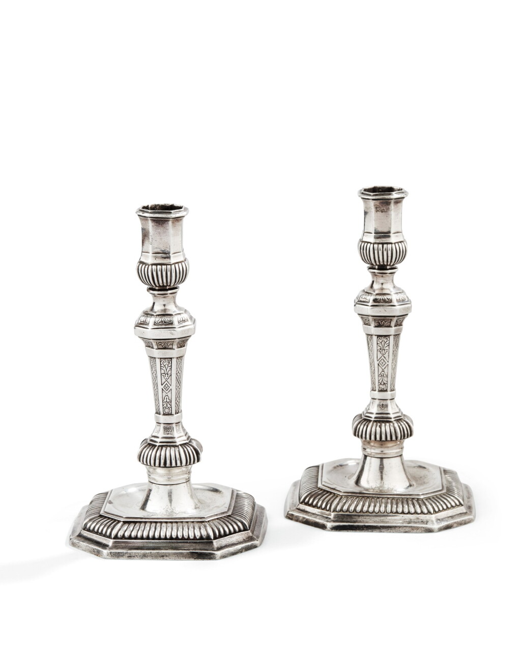 View full screen - View 1 of Lot 205. A PAIR OF SILVER CANDELSTICKS, BY NICOLAS GREBEUDE, PARIS, CIRCA 1708 | PAIRE DE FLAMBEAUX EN ARGENT, PAR NICOLAS GREBEUDE, PARIS, VERS 1708.