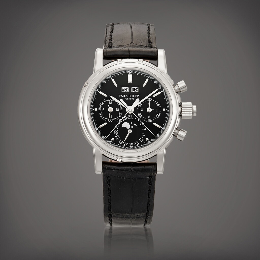 View full screen - View 1 of Lot 2295. Reference 5004 | A brand new white gold perpetual calendar split seconds chronograph wristwatch with moon phases, 24 hours and leap year indication, Made in 2009 | 百達翡麗 | 型號5004 | 全新白金萬年曆追針計時腕錶,備月相、24小時及閏年顯示,2009年製.
