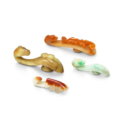 View full screen - View 1 of Lot 484. A jadeite, an agate and two jade belthooks, Qing dynasty 清 翠玉、瑪瑙及玉帶鉤一組四件.