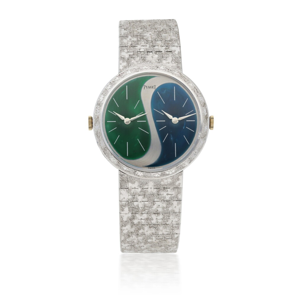 View full screen - View 1 of Lot 113. PIAGET | REF 612103 A 31 WHITE GOLD AND ENAMEL DUAL TIME BRACELET WATCH CIRCA 1975.