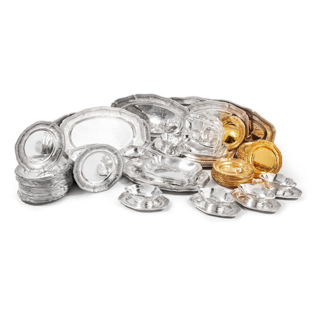 View full screen - View 1 of Lot 876. A Turkish set in the Régence style comprising 48 silver plates, 32 silver-gilt dessert plates, 26 silver dishes and 6 silver sauce-boats, Gumus Lale, Istanbul, modern.