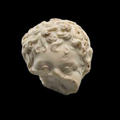 View full screen - View 1 of Lot 46. A FRAGMENTARY ROMAN MARBLE PORTRAIT HEAD OF A BOY, CIRCA MID 1ST CENTURY A.D..