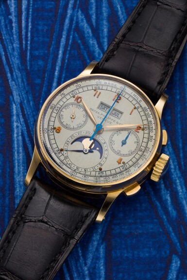 View full screen - View 1 of Lot 152. REFERENCE 1518 A YELLOW GOLD PERPETUAL CALENDAR CHRONOGRAPH WRISTWATCH WITH MOON PHASES, MADE IN 1947.