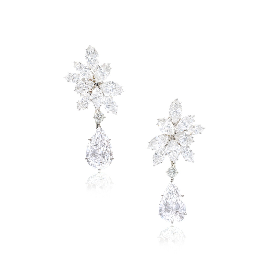 View full screen - View 1 of Lot 600. Attractive pair of diamond pendent ear clips.