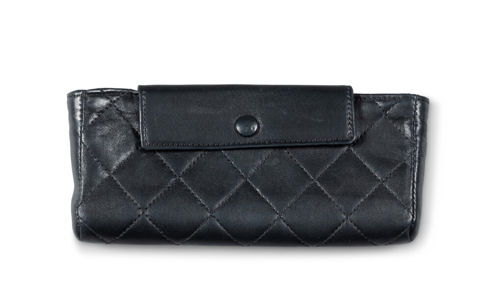 View full screen - View 1 of Lot 2008. Chanel, Paris, a black leather glasses case | Chanel, Paris, étui à lunettes en cuir noir.