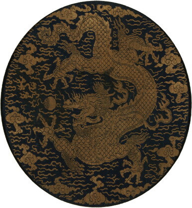 View full screen - View 1 of Lot 631. A blue silk brocade Imperial 'dragon' roundel, Ming dynasty | 明 石青地織金錦團龍紋圓補.