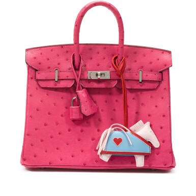 View full screen - View 1 of Lot 49. Rose Tyrien Ostrich Birkin 25 Palladium Hardware, 2019 and Rose Darling, Rouge Radieux and Bleu Céleste Swift and Milo Rodéo Robéo Charm.